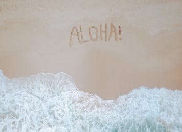 aloha-written-in-the-beach-sand